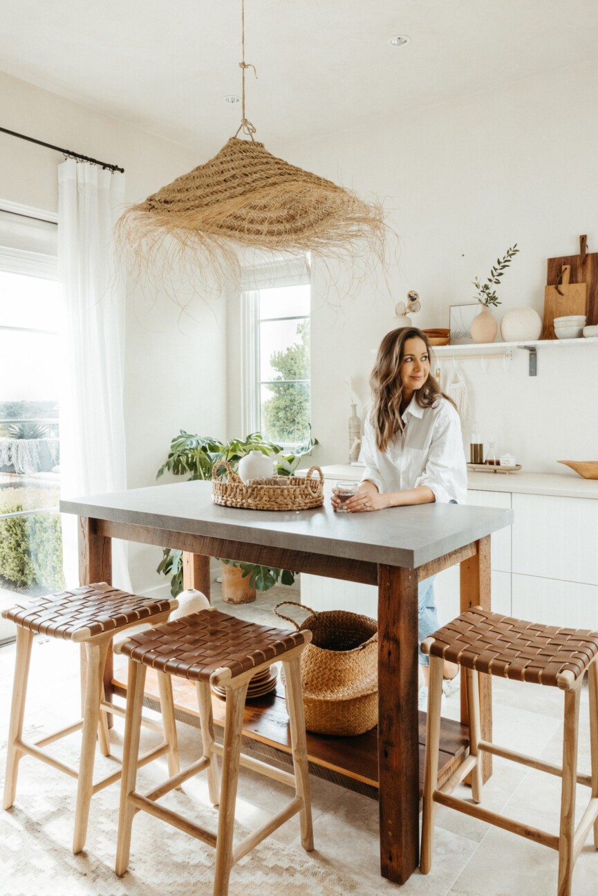 camille styles studio kitchen, woven light fixture pendant, island with stools