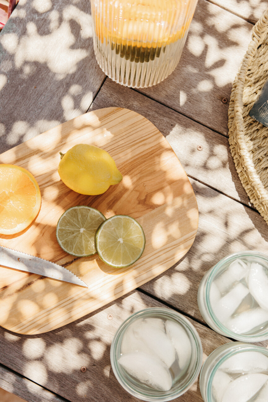 Citrus slices on cutting board.