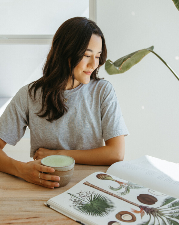 Woman drinking matcha.