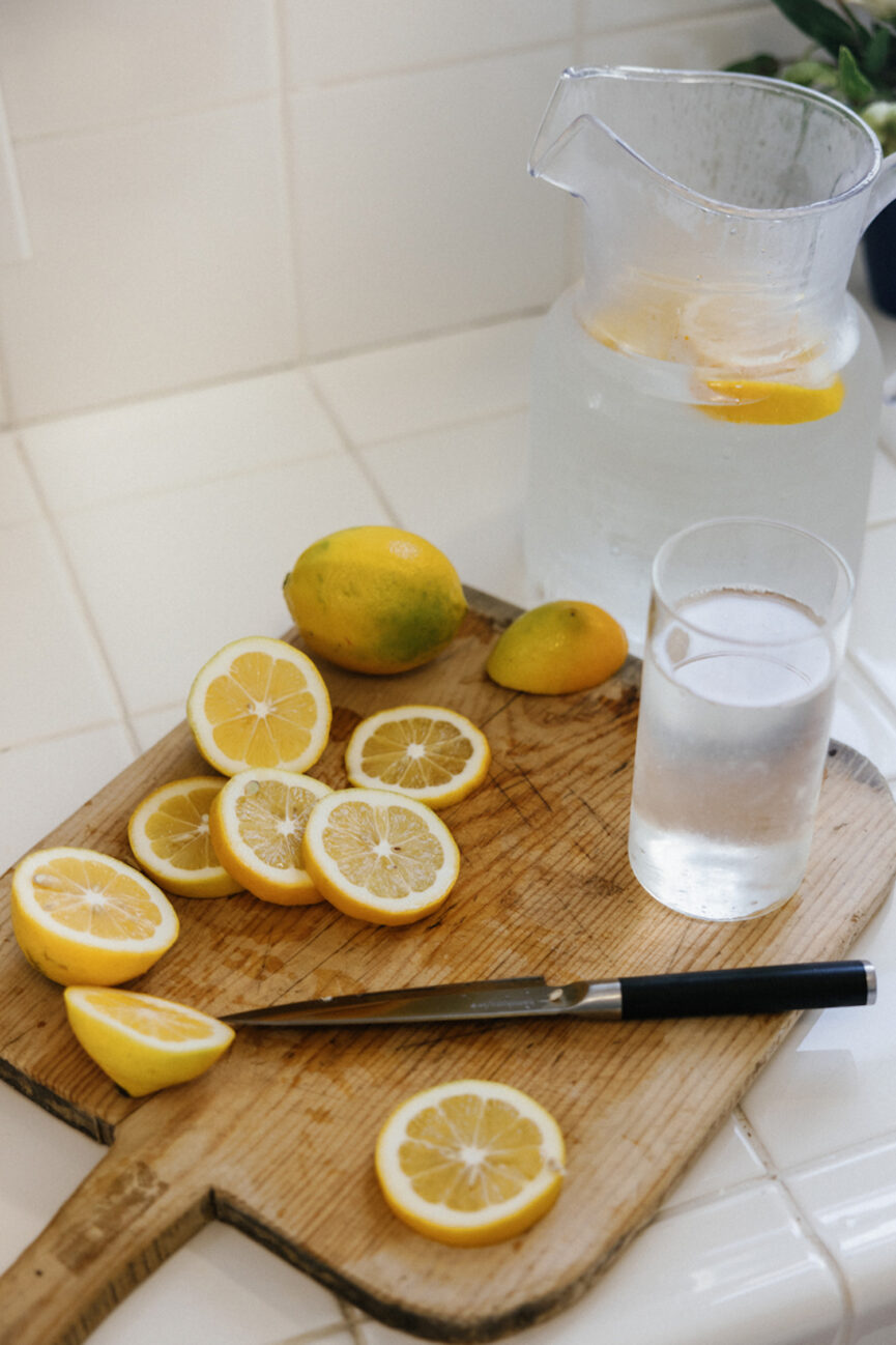 Sliced lemons on cutting board.