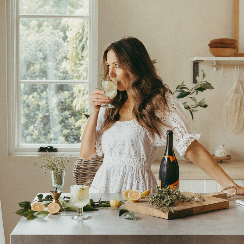 camille styles holding limoncello spritz