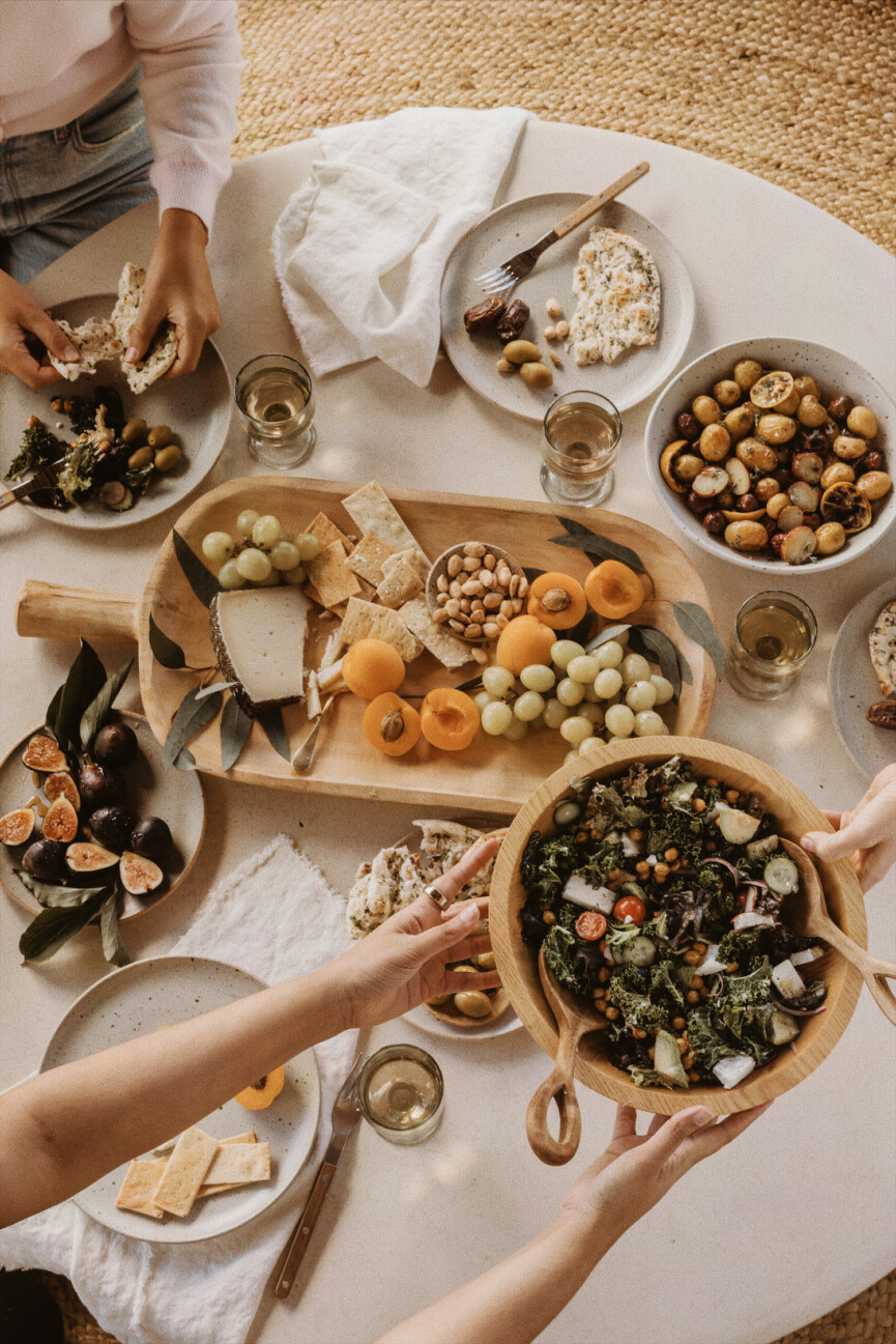 al fresco happy hour with appetizers and mediterranean salad