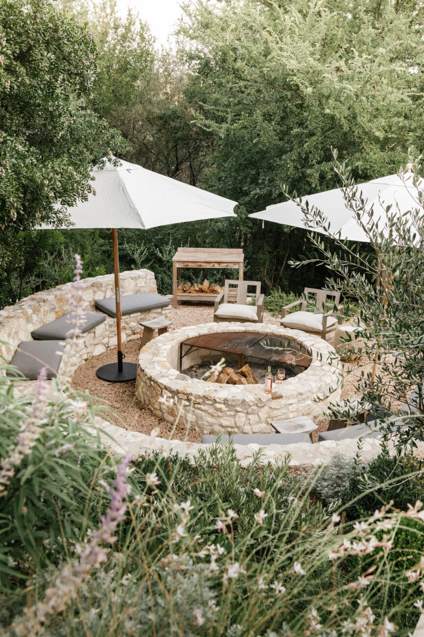 camille styles backyard firepit with umbrellas