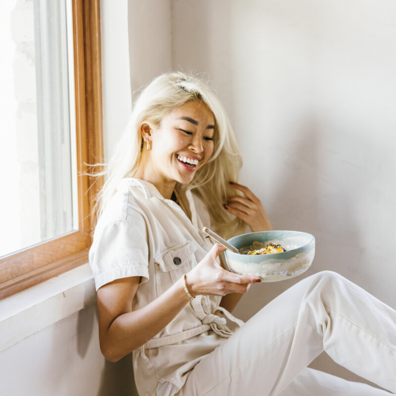 Remi Ishizuka eating grain bowl.