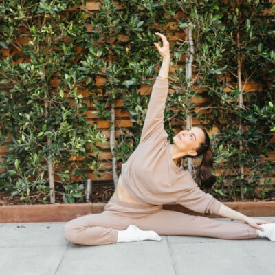 Woman stretching healthy daily habits.