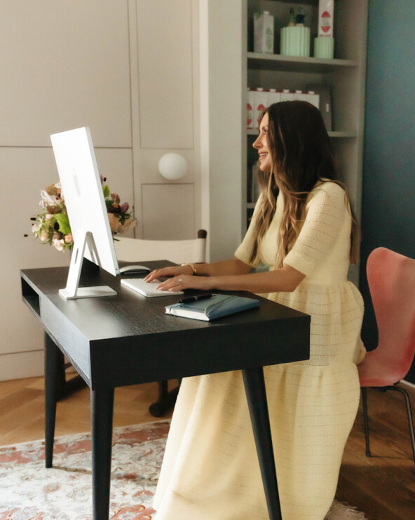 Woman practicing writing rituals.