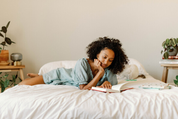 Woman reading in bed.