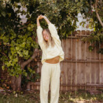 Woman stretching outside.