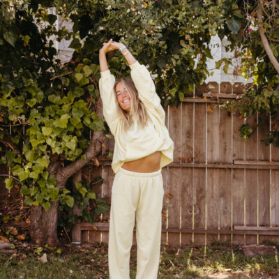 Woman stretching outside.